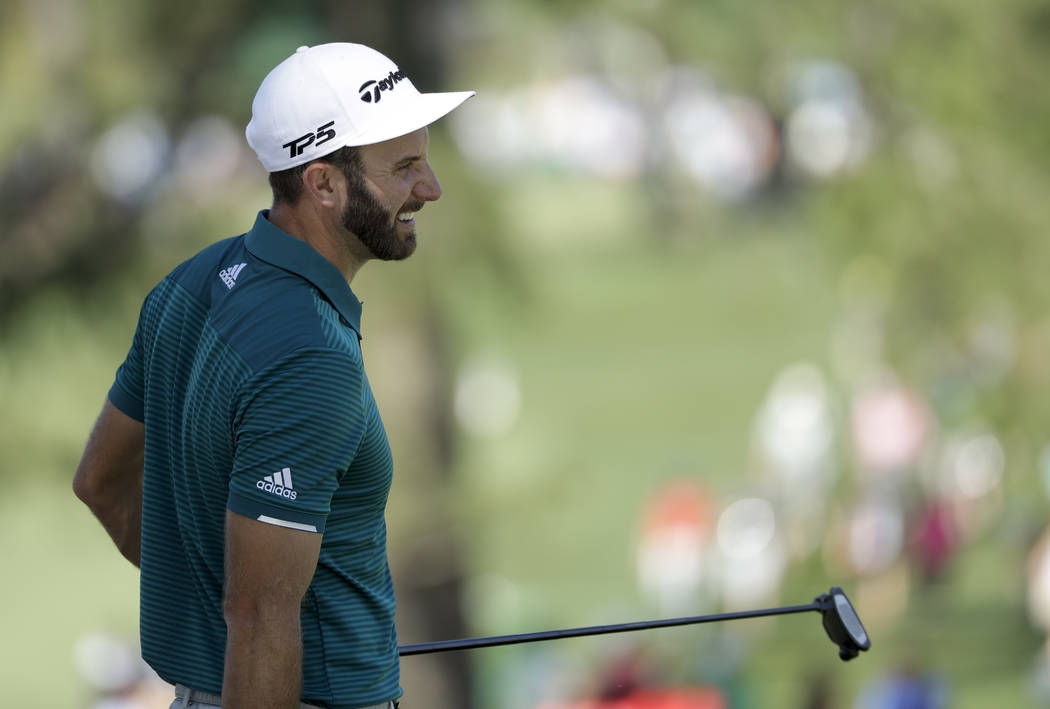 Dustin Johnson smiles on the seventh green during a practice round for the Masters golf tournament Tuesday, April 4, 2017, in Augusta, Ga. (Matt Slocum/AP)