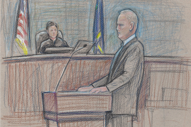 First Assistant U.S. Attorney Steven Myhre is depicted, with U.S. District Judge Gloria Navarro in the background, during his opening statement to jurors in the first Las Vegas trial against assoc ...