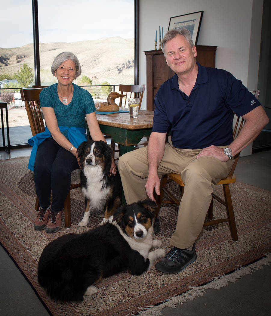 Scott and Laurie Lee with their dogs in their Blue Diamond home. (Tonya Harvey Real Estate Millions)