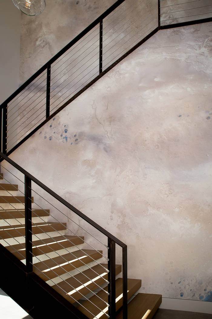 The home at 61 Arroyo road features a custom wall graphic of Mars’ surface near the staircase. (Tonya Harvey Real Estate Millions)