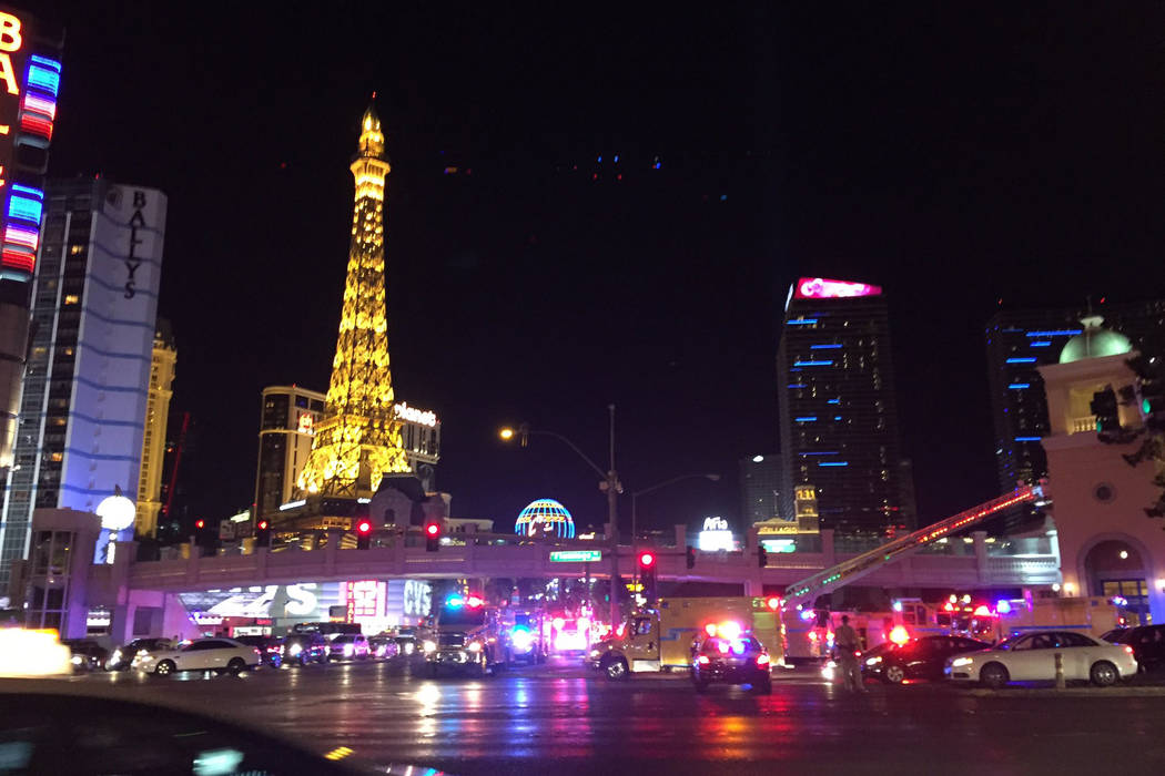 Emergency personnel respond to a fire on the roof of the Bellagio is on Thursday, April 13, 2017. (Chase Stevens/Las Vegas Review-Journal)