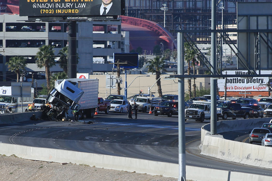 A semitrailer crash blocks northbound Interstate 15 near the Charleston Boulevard exit on Friday, April 14, 2017. (Brett Le Blanc Las Vegas Review-Journal) @bleblancphoto