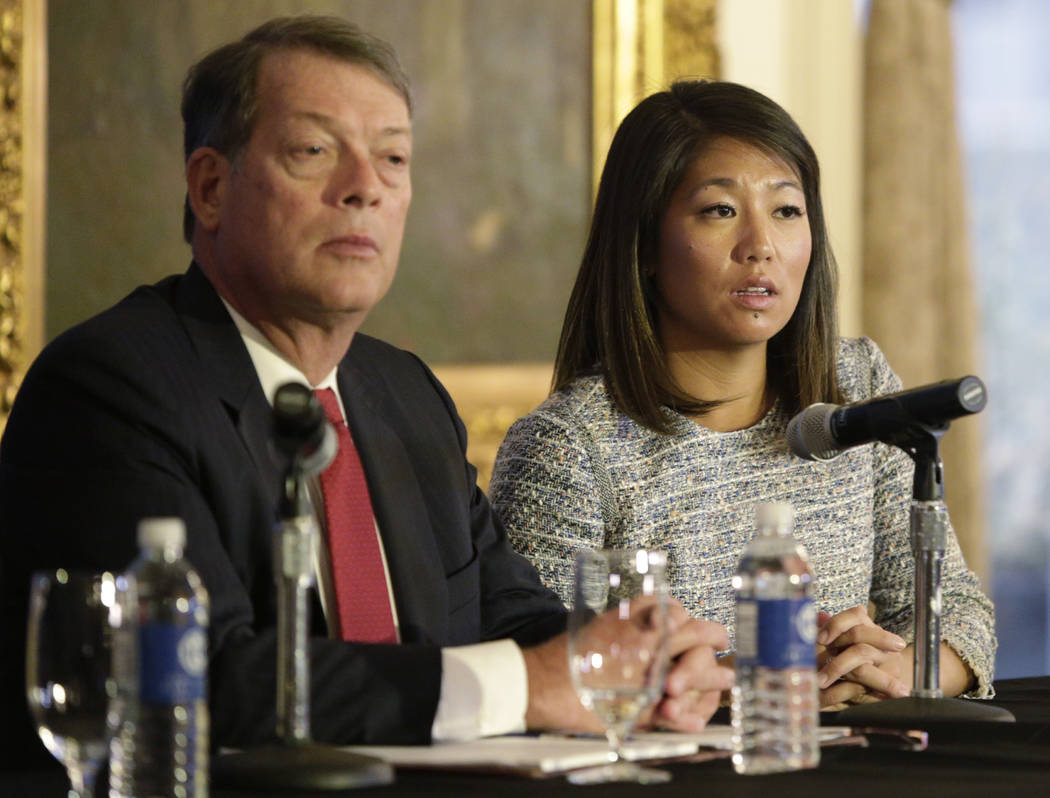 Crystal Pepper daughter of Dr. David Dao accompanied by attorney Stephen Golan, speaks at a news conference Thursday, April 13, 2017, in Chicago. Dao a passenger dragged from a United Express flig ...