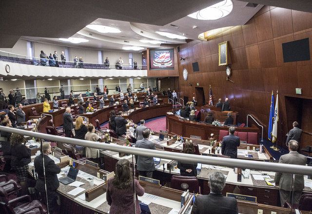 Members of the Nevada Assembly say the Pledge of Allegiance during the fourth day of the Nevada Legislative session on Thursday, Feb. 9, 2017, at the Legislative Building, in Carson City. (Benjami ...
