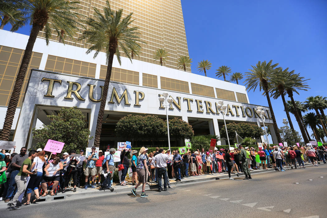 Demonstrators line Fashion Show Drive during a tax day protest at Trump International Hotel on Saturday, April 15, 2017. Brett Le Blanc Las Vegas Review-Journal @bleblancphoto
