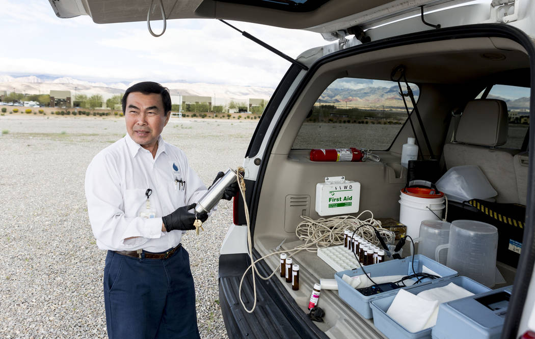 Water Quality Monitoring Field Specialist Daniel Luong tests water samples from the the Montessori reservoir that holds 20 million gallons of water located at Montessori Street and Warm Springs Ro ...