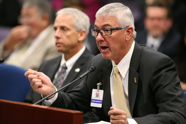 Rusty McAllister, representing Professional Fire Fighters of Nevada, testified at the Legislative Building in Carson City, Nev., on Friday, April 24, 2015, on a bill requiring local governments to ...