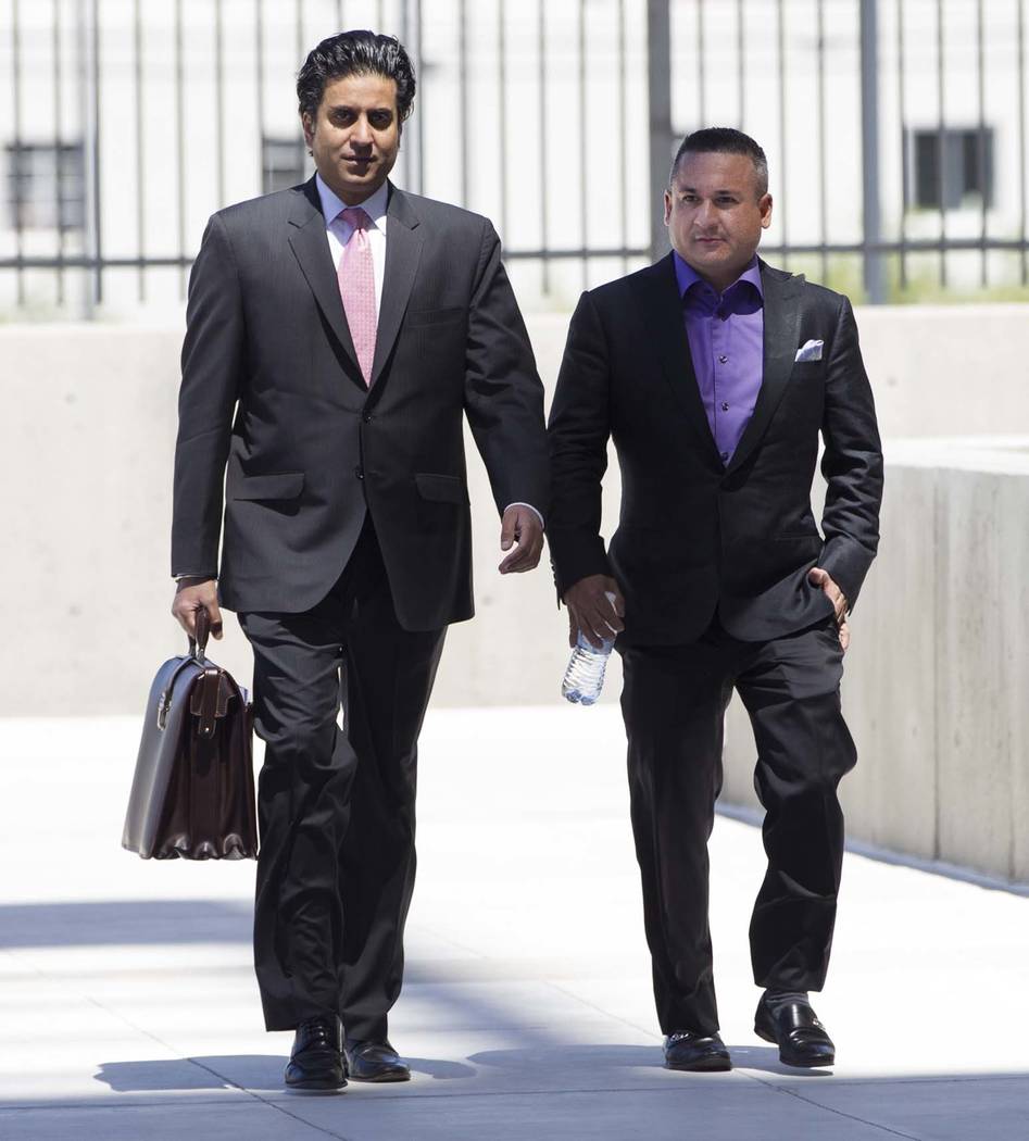 David Oancea, right, a professional sports gambler who goes by the nickname “Vegas Dave,” and his attorney Paul Padda walk to the Lloyd George U.S. Courthouse on Wednesday, April 19, 2017, in  ...