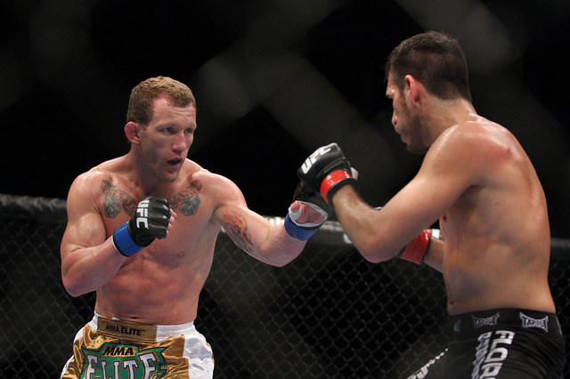 Gray Maynard, left, in action against Kenny Florian during their UFC fight at the TD Garden on Aug. 28, 2010, in Boston. Maynard won via unanimous decision. (AP Photo/Gregory Payan)