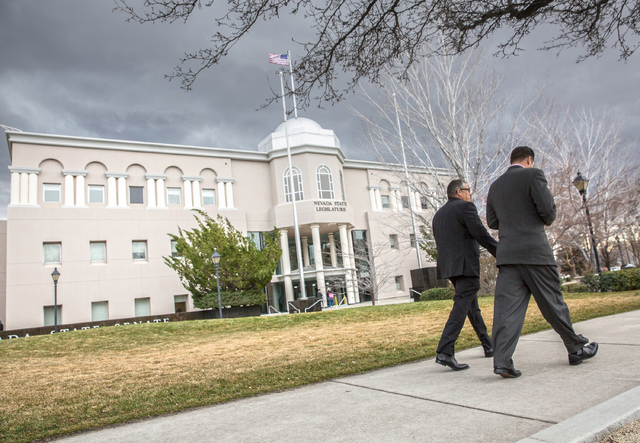 Legislators walk into the Legislative Building during the fourth day of the Nevada Legislative session on Thursday, Feb. 9, 2017, in Carson City. (Benjamin Hager/Las Vegas Review-Journal) @benjami ...
