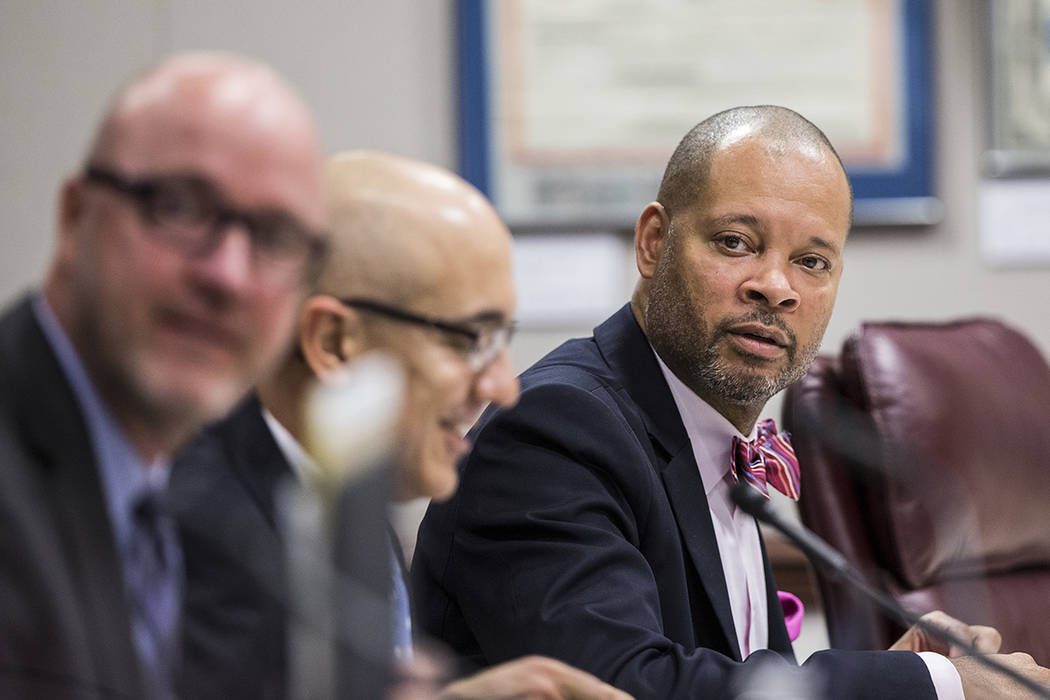 Senate Majority Leader Aaron Ford listens to Sen. Tick Segerblom, D-Nev., during the second day of the Nevada Legislative session on Tuesday, Feb. 7, 2017, at the Legislative Building, in Carson C ...