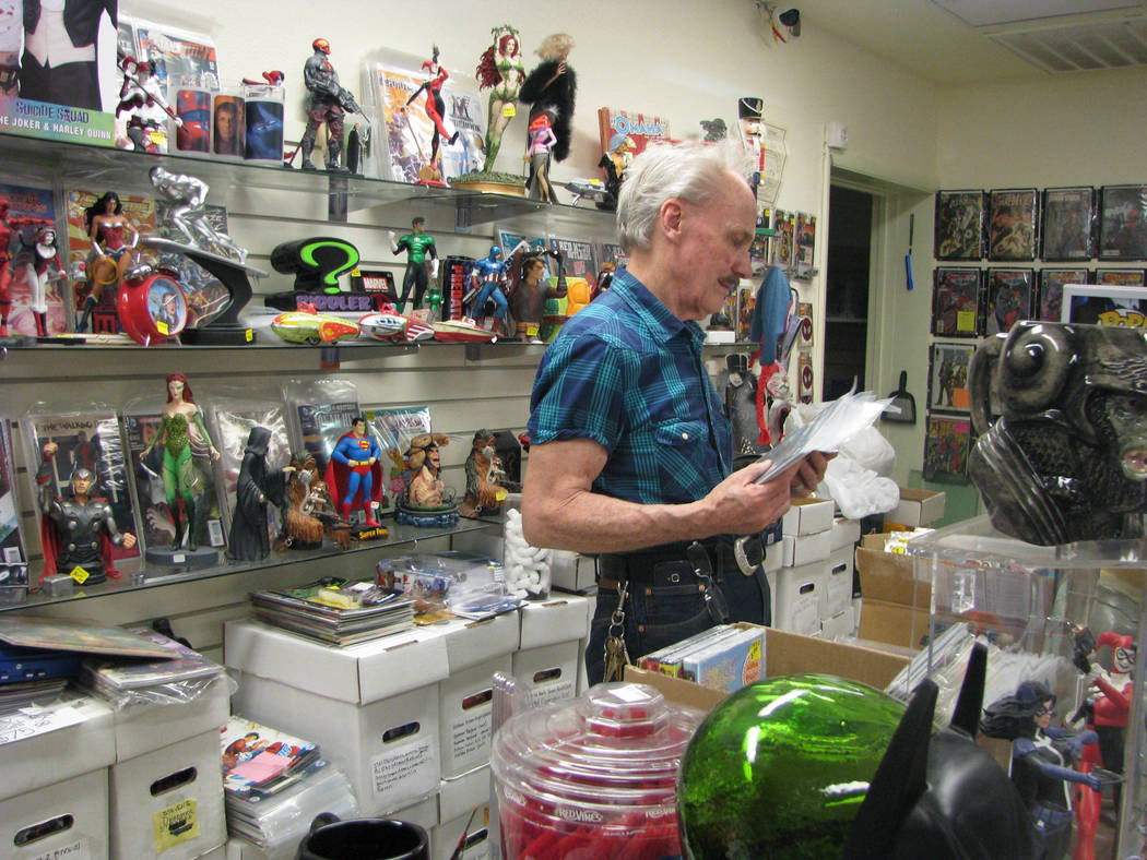 Owner Steve Riddle is still unpacking and setting up his Velvet Underground Comics at its new location at 825 S. Decatur Blvd. There are fifty different titles that retailers are set to give out o ...