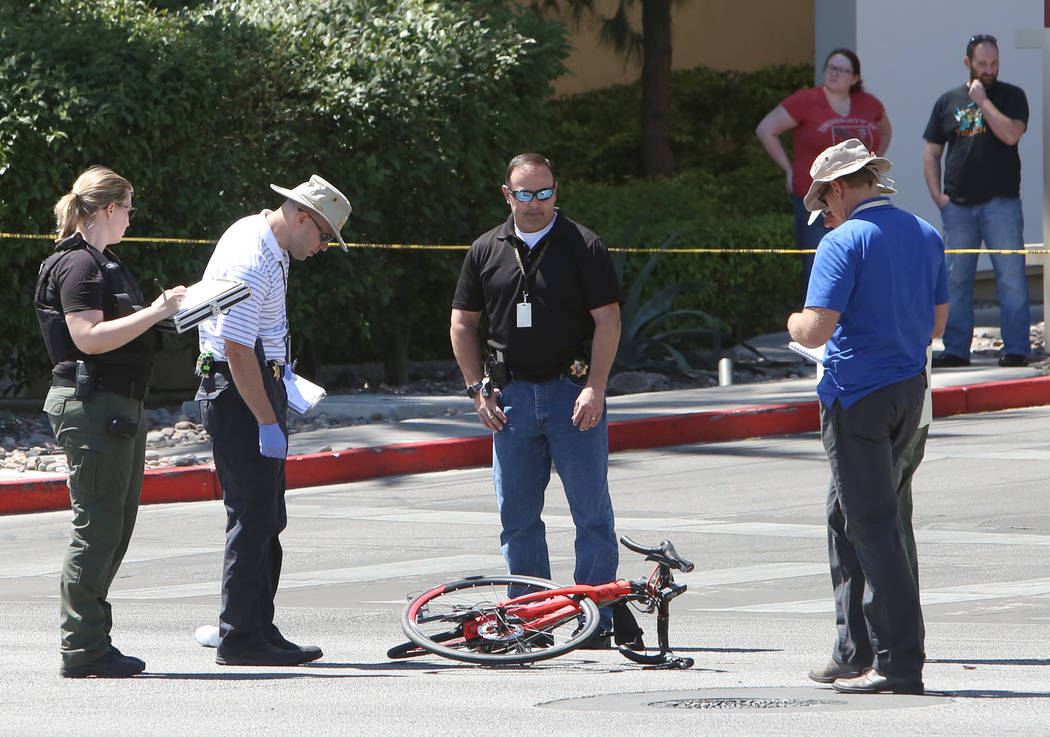 Las Vegas police investigate a fatal crash that left a bicyclist dead in the western Las Vegas Valley, near Red Rock Resort, on Tuesday, April 18, 2017, in Las Vegas. (Bizuayehu Tesfaye/Las Vegas  ...