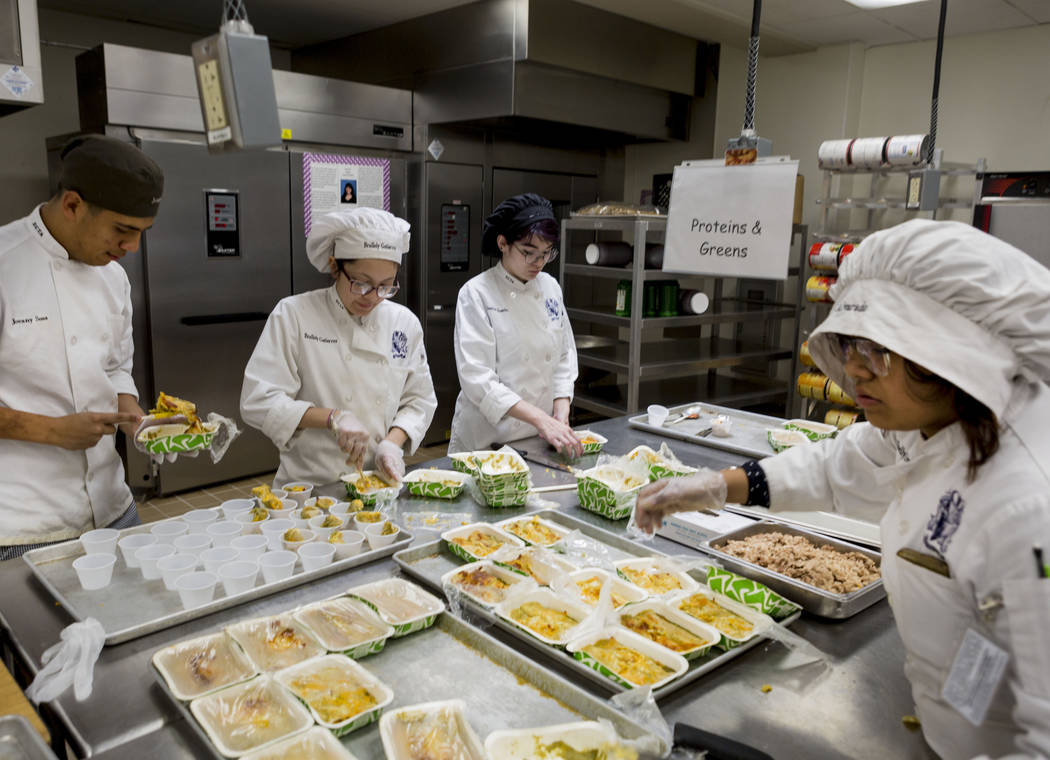 East Career & Technical Academy culinary students prepare samples to be served during Clark County School District's sampling of their 2017-2018 cafeteria lunch menu to different schools in CC ...