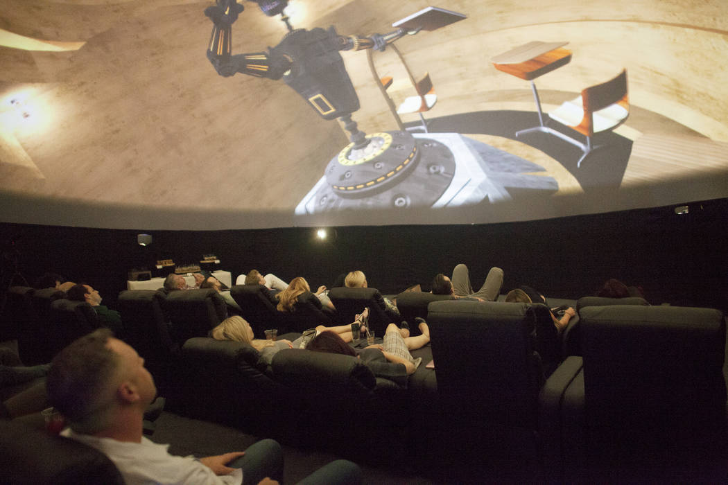 An audience watches a movie preview Thursday, April 27, 2017, inside the Dome, a 360 theatre that will be showing six different films to the public at the Container Park in downtown Las Vegas. Rac ...