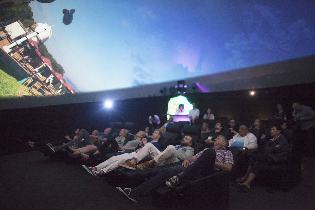 An audience watches a movie preview Thursday, April 27, 2017, inside the Dome, a 360 theatre that will be showing six different films to the public at the Container Park in Downtown Las Vegas. Rac ...