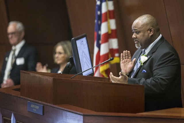 Assembly Speaker Jason Frierson, right, gives a round of applause to the family members of assemblymen on the first day of the Nevada Legislature, Monday, Feb. 6, 2017, in Carson City. (Benjamin H ...