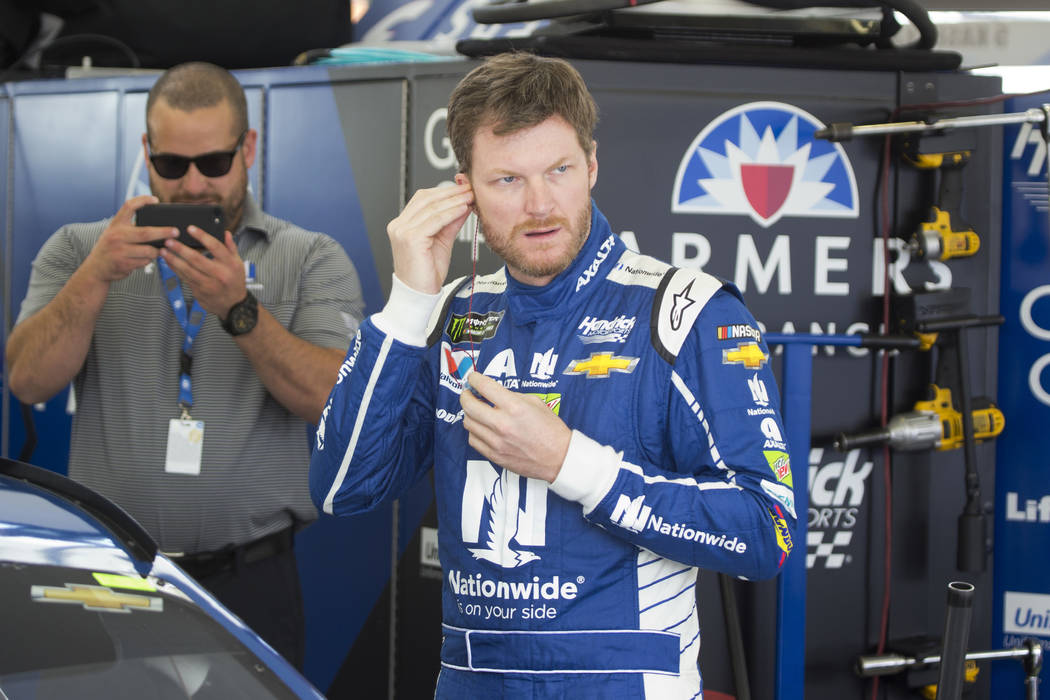 Driver Dale Earnhardt Jr. gets ready for practice during qualifying for the Monster Energy NASCAR Cup Series auto race Friday, March 10, 2017, in Las Vegas. Steve Marcus AP