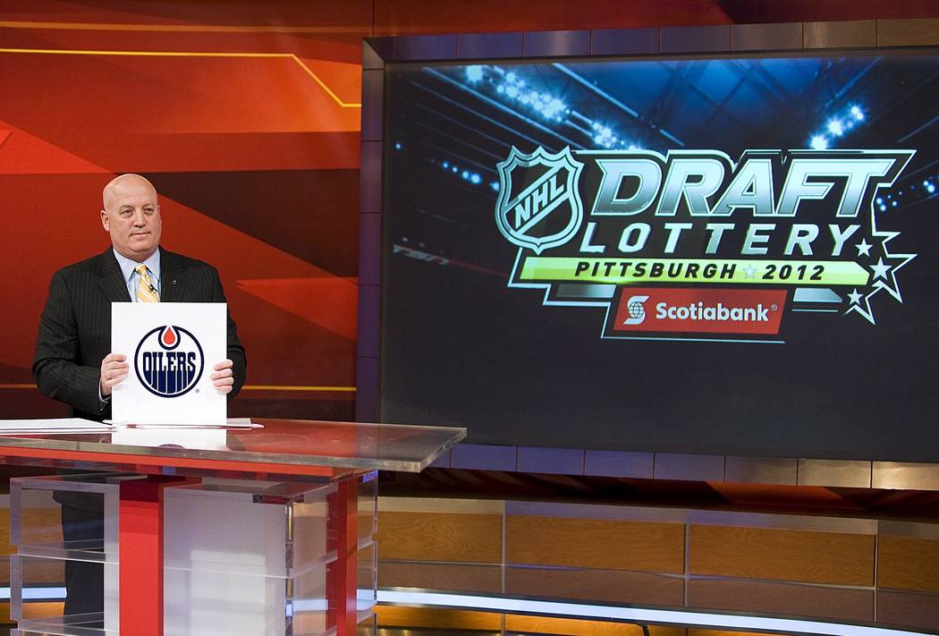 NHL deputy commissioner Bill Daly reveals the Edmonton Oilers as number 1 in the NHL Draft Lottery at the TSN studios inToronto on Tuesday April 10, 2012. Edmonton won the right to pick first over ...