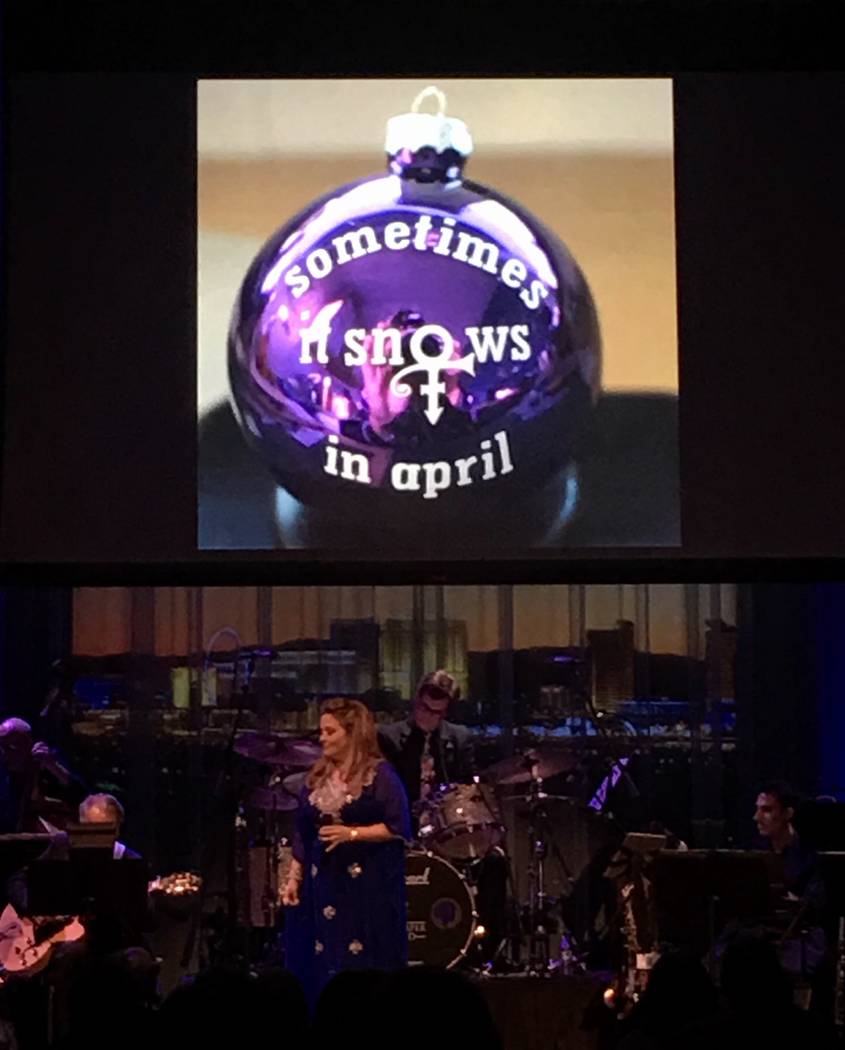 Elisa Fiorillo is shown with an image of a holiday ornament with the title of her favorite Prince song during her performance at Cabaret Jazz at Smith Center on Monday, April 24, 2017. (John Katsi ...