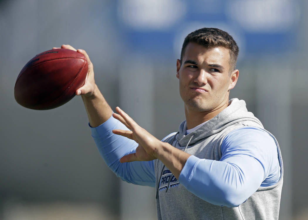 FILE - In this March 21, 2017, file photo, quarterback Mitch Trubisky passes during North Carolina's pro timing football day in Chapel Hill, N.C. The Cleveland Browns are inclined to keep the No.  ...