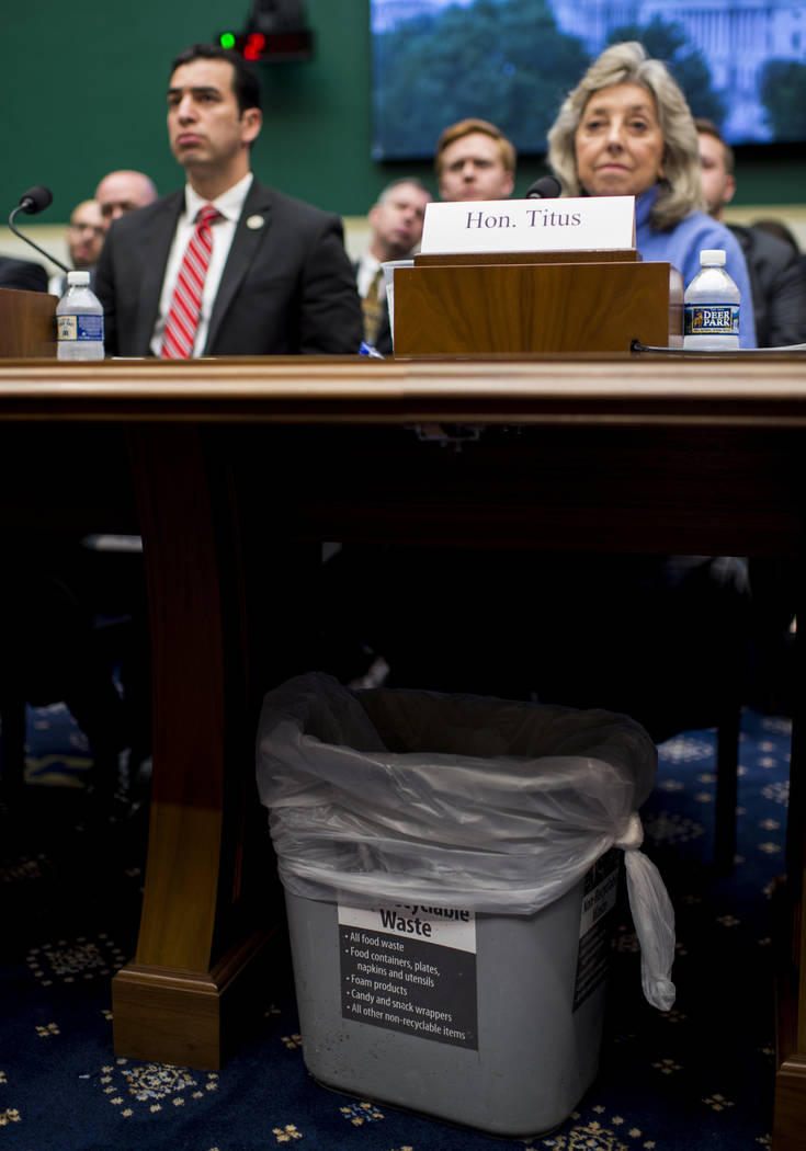 A waste basket sits under the witness table as Rep. Ruben Kihuen, D-Nev., and Rep. Dina Titus, D-Nev., unite in opposition to using Yucca Mountain as a nuclear waste disposal site during the House ...