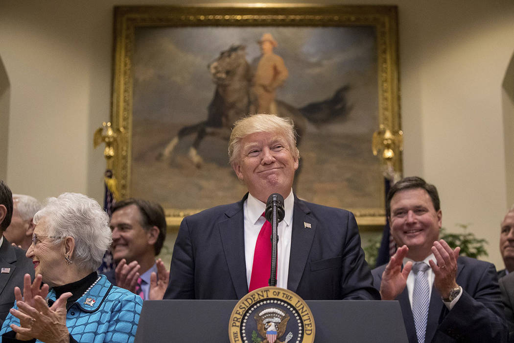 President Donald Trump pauses while speaking before signing the Education Federalism Executive Order, Wednesday, April 26, 2017, in the Roosevelt Room of the White House in Washington. (AP Photo/A ...