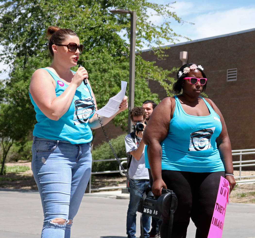 Event coordinators Holly Lamella, left, and Jovanah Watkins speak to the crowd before &quot;No More Shame Slut Walk&quot; at the UNLV campus, Wednesday, April 26, 2017. Gabriella Benavidez ...