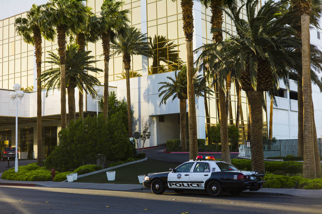 A Las Vegas police squad car sits outside of the Trump International after a suspect started a small fire in a bathroom at the hotel in Las Vegas on Wednesday, April 26, 2017. Chase Stevens Las Ve ...