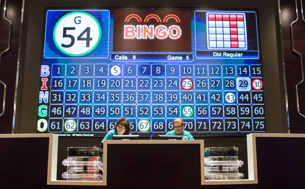 Bingo agents call out numbers during a special preview day for employees as well as their friends and family in the new bingo hall at the Palace Station hotel-casino in Las Vegas on Tuesday, April ...