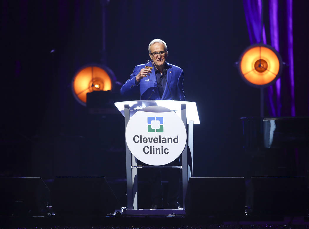 Larry Ruvo, co-founder and chairman of Keep Memory Alive, raises his glass during Keep Memory Alive's 21st annual Power of Love gala, raising money for Cleveland Clinic Lou Ruvo Center for Brain H ...