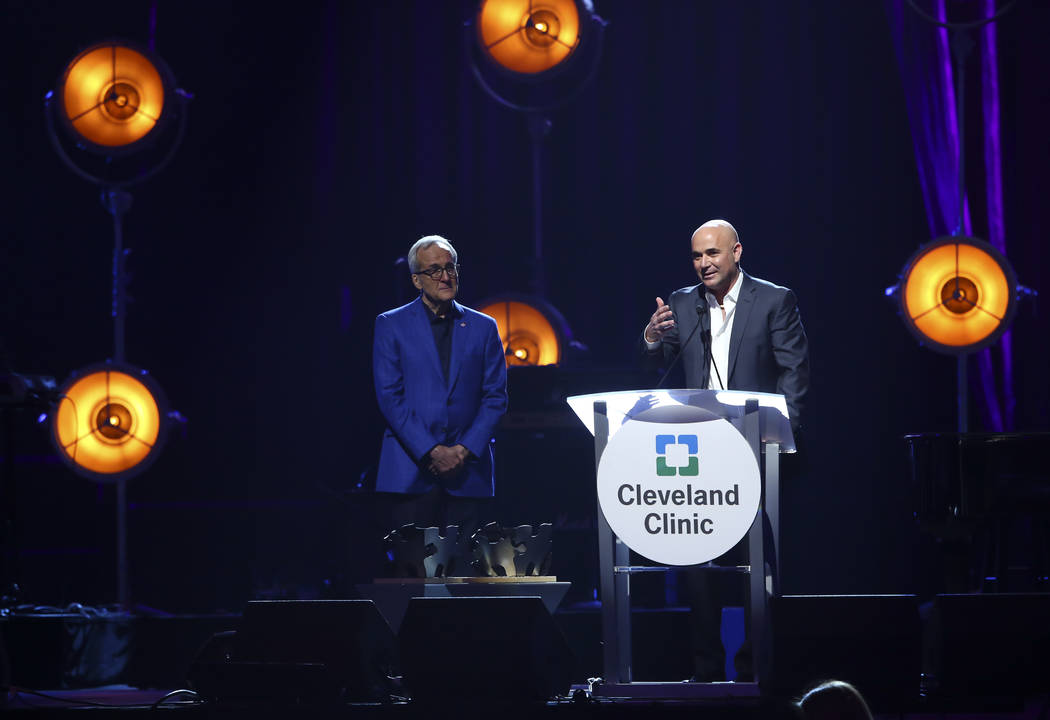 Honoree Andre Agassi, a tennis great and Las Vegas resident, right, speaks alongside Larry Ruvo, co-founder and chairman of Keep Memory Alive, during Keep Memory Alive's 21st annual Power of Love  ...