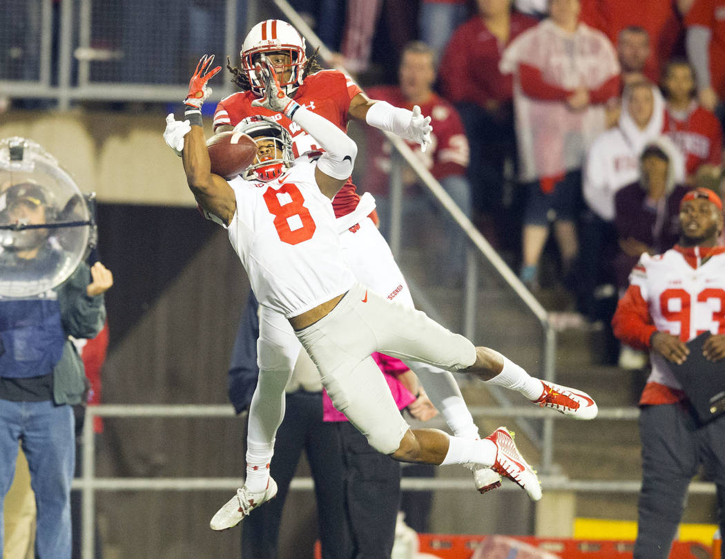 Oct 15, 2016; Madison, WI, USA;  Ohio State Buckeyes cornerback Gareon Conley (8) breaks up the pass intended for Wisconsin Badgers wide receiver Robert Wheelwright (15) during the fourth quarter  ...