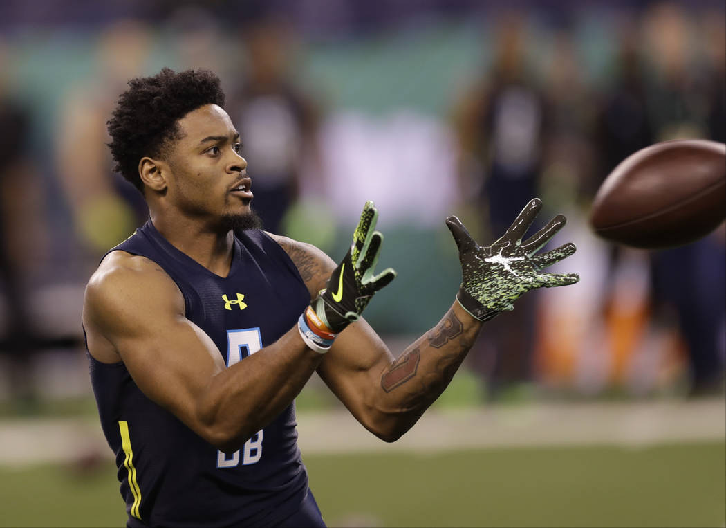 Ohio State defensive back Gareon Conley runs a drill at the NFL football scouting combine Monday, March 6, 2017, in Indianapolis. (AP Photo/David J. Phillip)