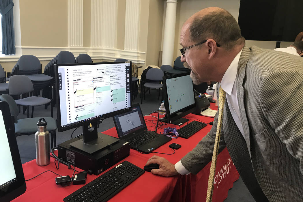 Larry Korb with Dominion Voting shows new voting machine and tabulation technology Wednesday, April 26, 2017 at the state Capitol in Carson City. Sandra Chereb Las Vegas Review-Journal