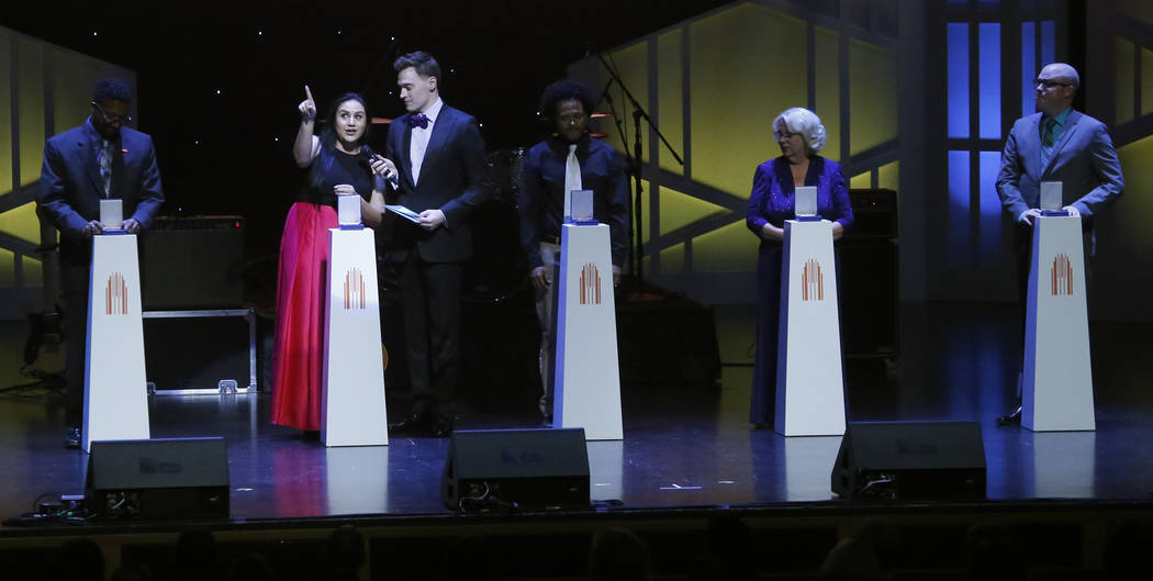 Erich Bergen presents an award to Cheyenne High School teacher Hela Naziri  during the second annual Heart of Education awards at The Smith Center on Saturday, April 29, 2017, in Las Vegas. Christ ...