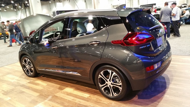 STAN HANEL/DRIVE
GM showcased its newest Chevrolet Bolt EV electric car that can travel more than 238 miles between battery pack recharging sessions while accelerating from zero to 60 mph in under ...