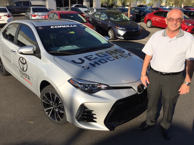 COURTESY
The 2017 Toyota Corolla, which is celebrating its 50th anniversary, is seen with Findlay Toyota internet sales manager Jacob Henn.