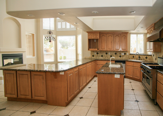 This home in Rancho Bel Air at 2500 Wimbledon Drive is listed for $699,900. This is the kitchen. ELKE COTE/RJREALESTATE.VEGAS