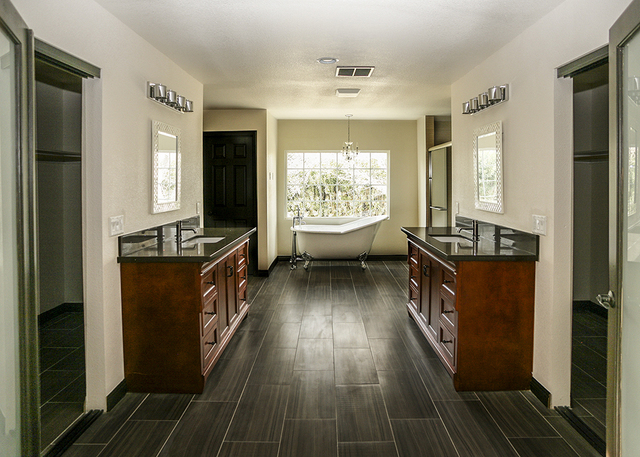 This home at 2800 Ashworth Circle has an enormous, upstairs bath with claw-foot tub overlooking the garden. ELKE COTE/RJREALESTATE.VEGAS
