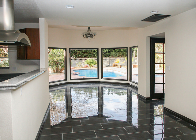 ELKE COTE/RJREALESTATE.VEGAS
This Rancho Nevada Estates home features glossy porcelain-tile floors.