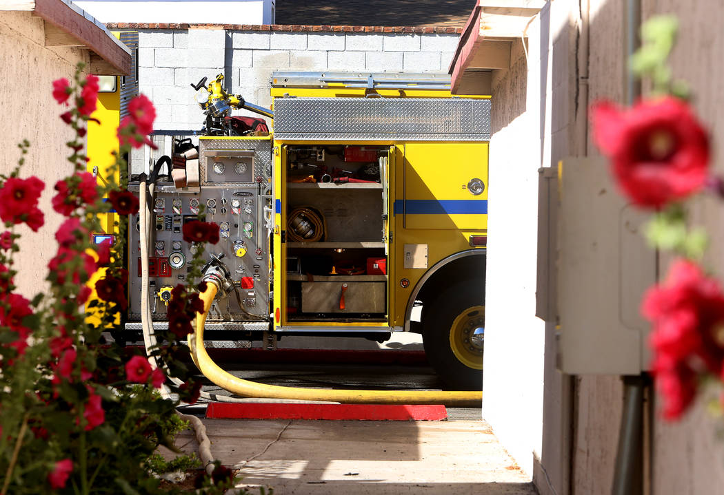 Clark County fire truck oitside 741 and 743 Greenbriar Townhouse Way where firefighters battle a fire in Las Vegas on Wednesday, May 3, 2017. (Bizuayehu Tesfaye/Las Vegas Review-Journal) @bizutesfaye