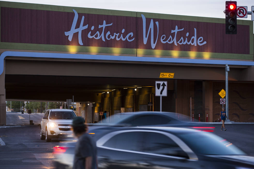Cars and pedestrians move along Bonanza Road near the Historic Westside sign above F Street in Las Vegas on Wednesday, April 26, 2017. Chase Stevens Las Vegas Review-Journal @csstevensphoto