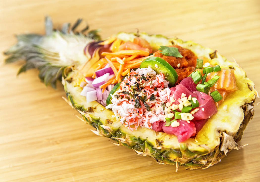 Tail & Fin in Las Vegas serves custom poké bowls served in pineapples