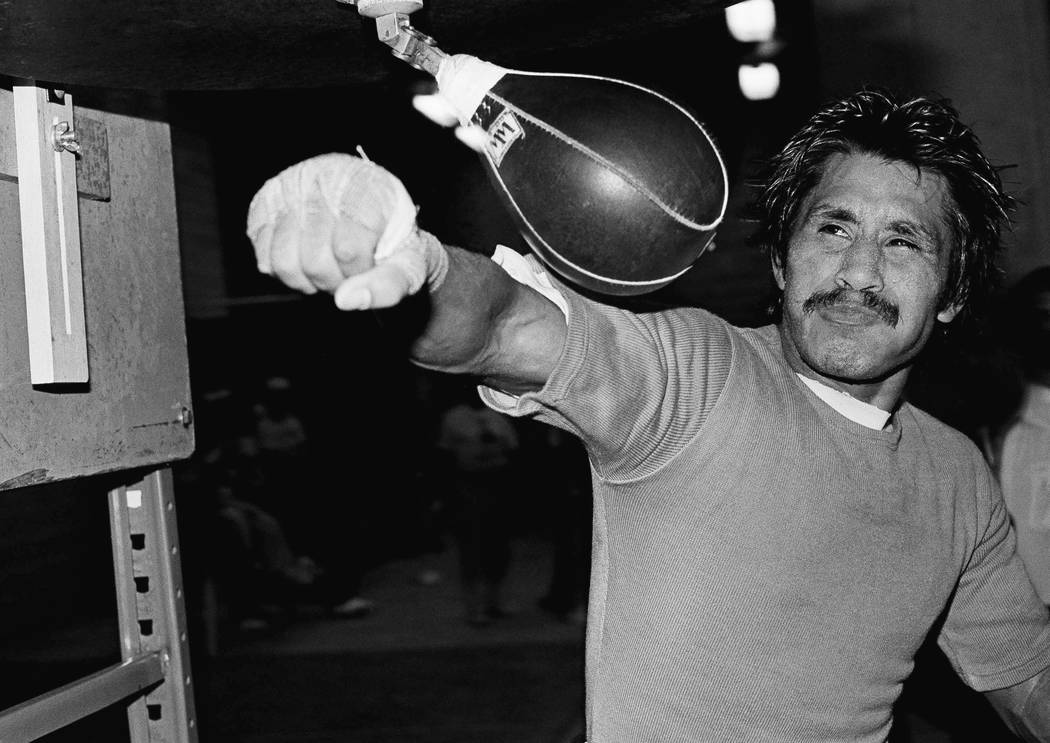 WBC World Bantamweight Champion Lupe Pinter of Mexico works on the speed bag as he gets ready for his title fight in the Superdome Friday, Dec. 2, 1982 in New Orleans. Pintor will be trying to cla ...