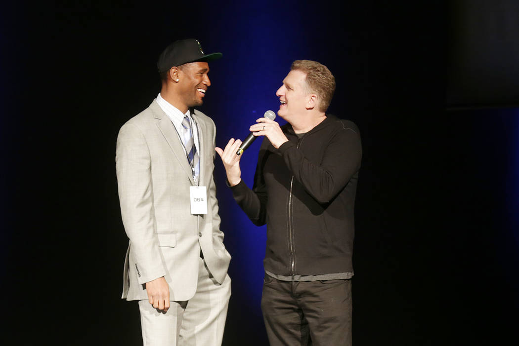 Derrick Byars, from left, talks to Michael Rapaport after being drafted for the Tri State team on Sunday, April 30, 2017, at the BIG3 inaugural draft at Planet Hollywood in Las Vegas. BIG3 is Ice  ...