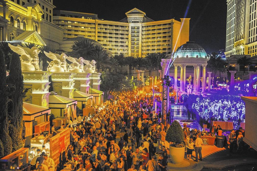 Over 2,500 guests pack the Garden of the Gods Pool Oasis during The Grand  Tasting at Vegas Uncork'd on Friday, April 28, 2017, at Caesars Palace  hotel-casino, in Las Vegas. The event