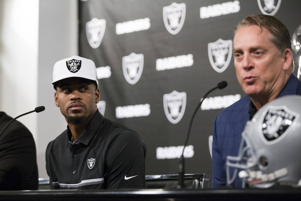 Oakland Raiders first round NFL draft pick Gareon Conley of Ohio State, left, listens to head coach Jack Del Rio during a press conference at the Raiders Headquarters on Friday, April 28, 2017, in ...