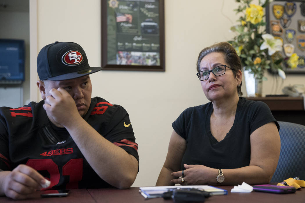 Jose Guzman, left, and his mother Edith during an interview on her other son Jose De Jesus Alatorre Guzman who was killed last year at the age of 19 while walking on the street, on Tuesday, May 9, ...