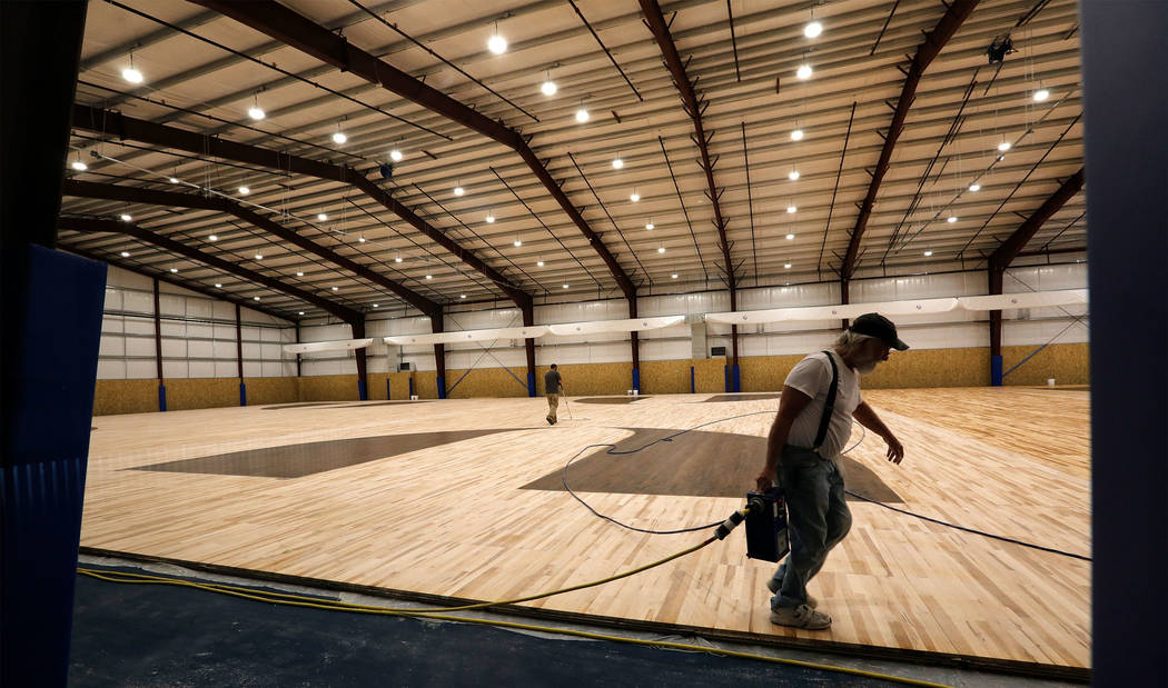 Men work in the field house under construction in Las Vegas, Friday, May 5, 2017. Chitose Suzuki Las Vegas Review-Journal @chitosephoto